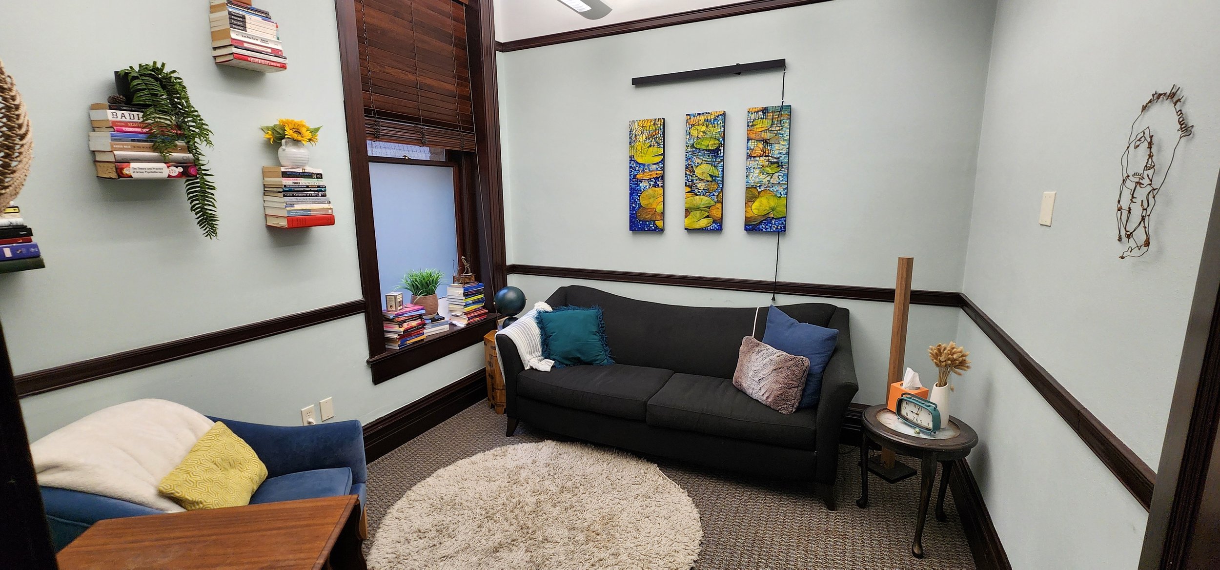 Reception area with seating and artwork